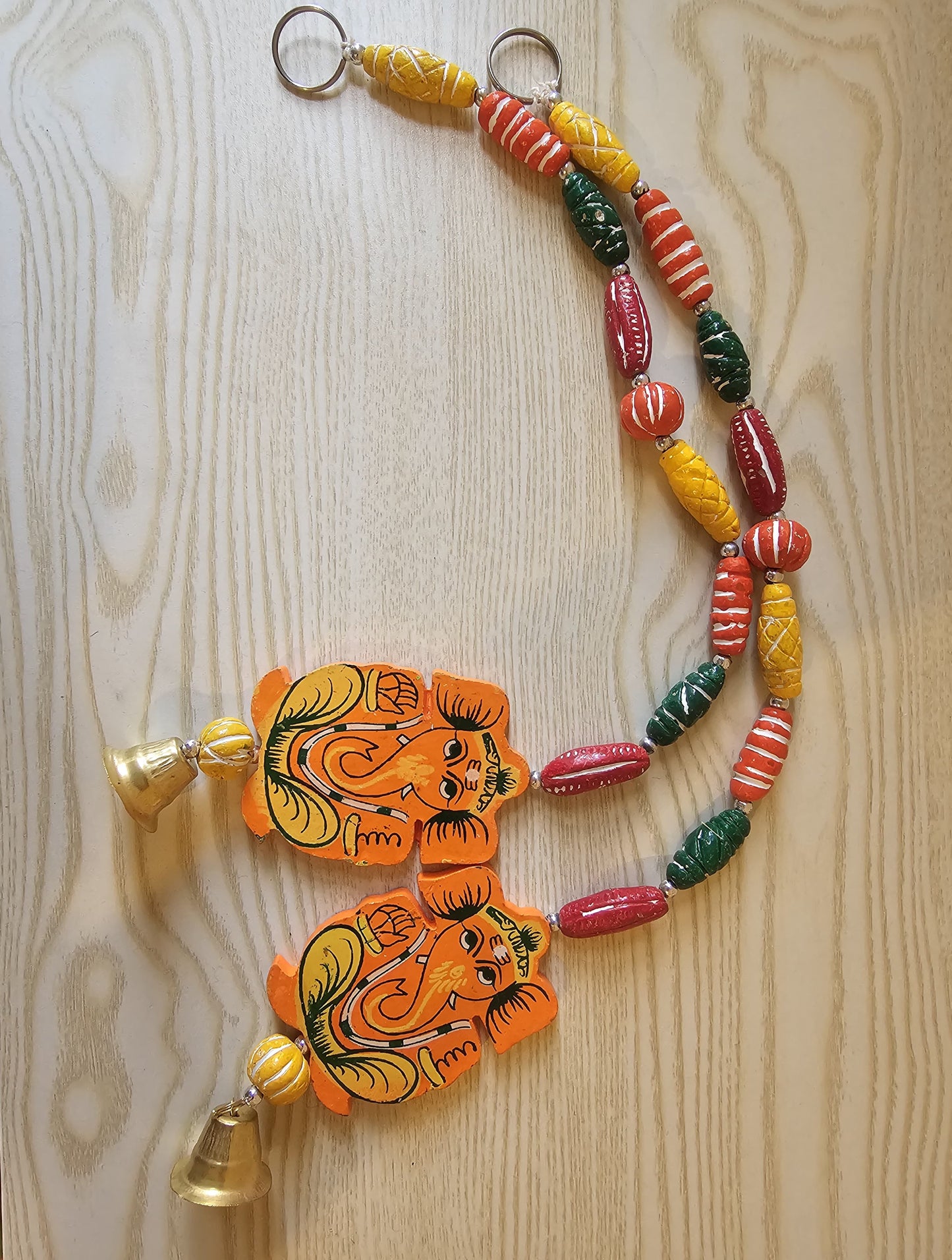Wooden Ganesh wall hanging with bells