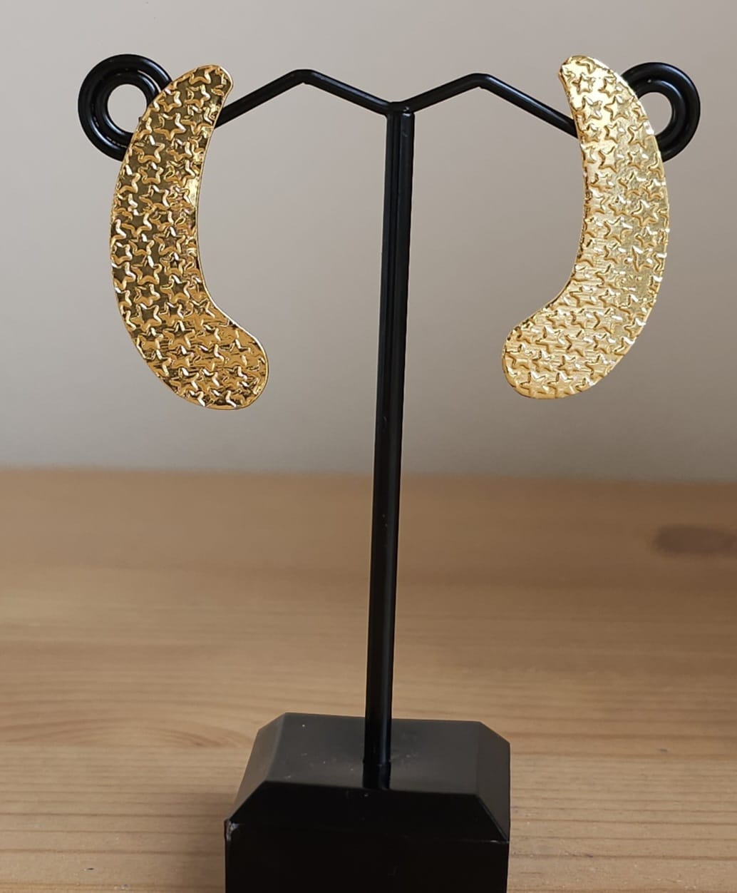 Crescent- shaped brass ear studs