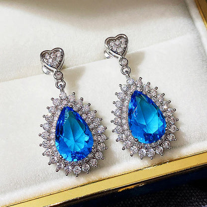 Silver Plated Anti Tarnish American Diamond Studded Blue Teardop Shape Ice Cut Drop Earrings