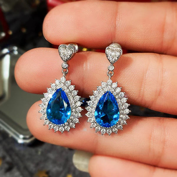 Silver Plated Anti Tarnish American Diamond Studded Blue Teardop Shape Ice Cut Drop Earrings