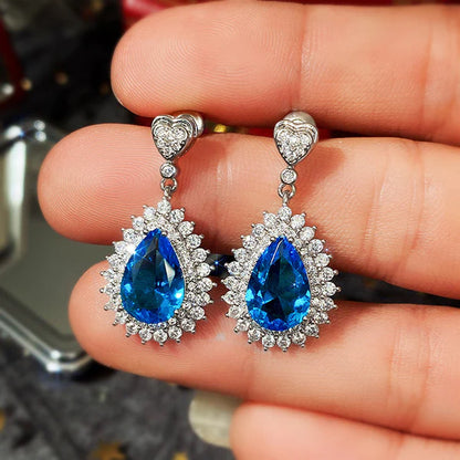 Silver Plated Anti Tarnish American Diamond Studded Blue Teardop Shape Ice Cut Drop Earrings