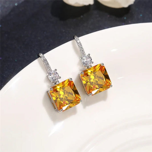 Silver Plated Anti Tarnish American Diamond Studded Yellow Square Shape Crushed Ice Cut Hanging Earrings